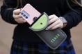 Half of post-primary schools apply for phone pouch funding
