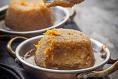 Steamed marmalade pudding with ginger and orange caramel sauce