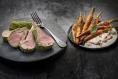 Herb-crusted rack of lamb with spiced carrots and labneh