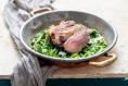 Roast lamb rump with jus gras, peas and mint