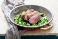 Roast lamb rump with jus gras, peas and mint