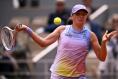 Iga Swiatek dismantles Raducanu to maintain quest for fourth French Open title in a row 