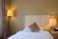 When did hotels stop offering single-occupancy rooms at a reasonable price?