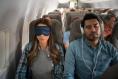 Would you want to be woken for an in-flight meal of rubbery pasta?