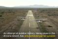 World's first mid-air 'plane swap' stunt only partially successful