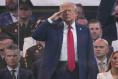 Trump attends a birthday military parade as protests spread across the United States