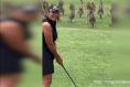 Mob of kangaroos faces up to golfer in Australia